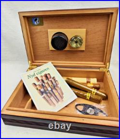 A wooden humidor is a box designed to store cigars at a minimum level of humidit