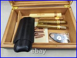 A wooden humidor is a box designed to store cigars at a minimum level of humidit