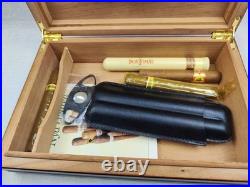 A wooden humidor is a box designed to store cigars at a minimum level of humidit